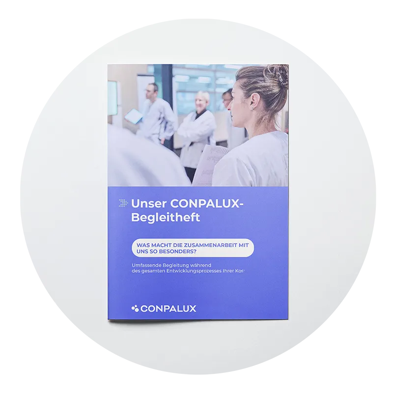 Lead-magnet-de Brochure Conpalux avec couverture bleu et texte blanc, montrant des professionnels en blouses blanches discutant en arrière-plan.